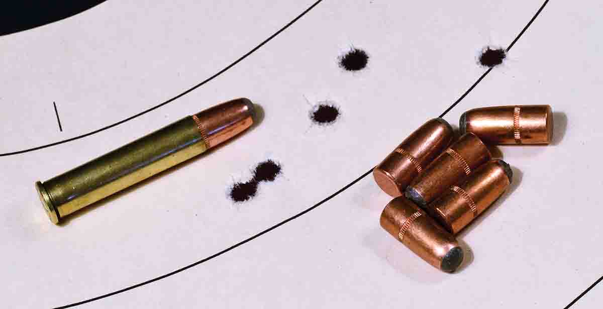 Sierra 200-grain roundnose bullets, the traditional deer bullet in the 35 Remington. Five-shot group measuring 2.7 inches at 100 yards, using original Stevens tang sight. At 1,834 fps, this would be a good short-range deer load.